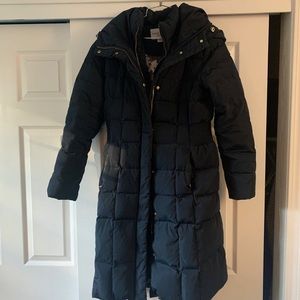 Navy blue size M cole haan winter jacket with extra large hood and double zip.